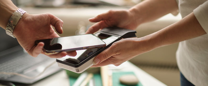 Person paying with their mobile device