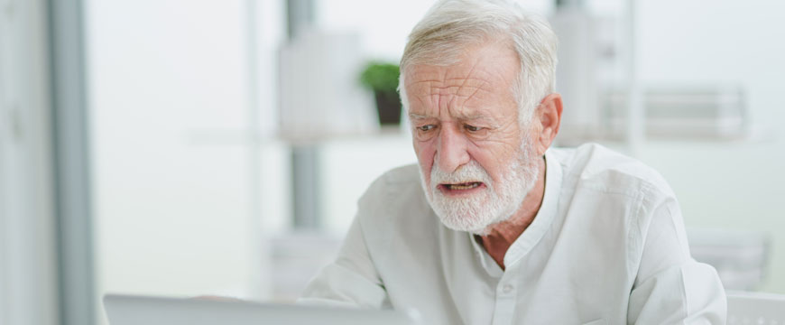 Man on the Computer in Concern