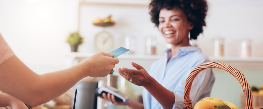 Businesswoman Accepting Credit Card Payment