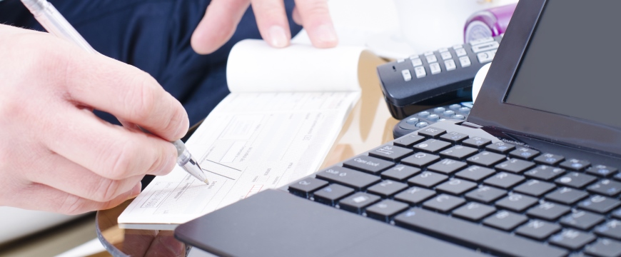 Businessman Writing a Check