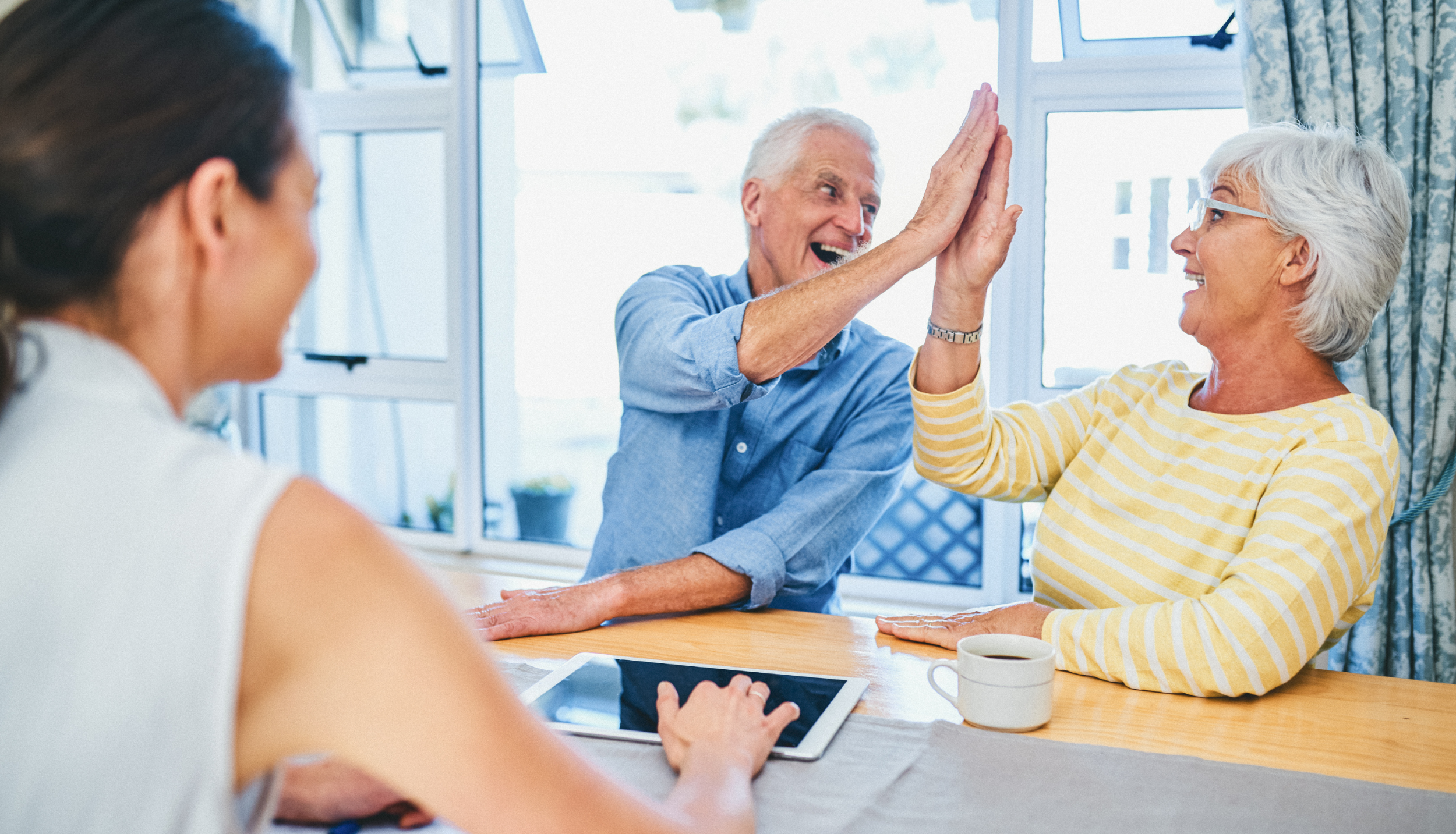 senior couple clapping